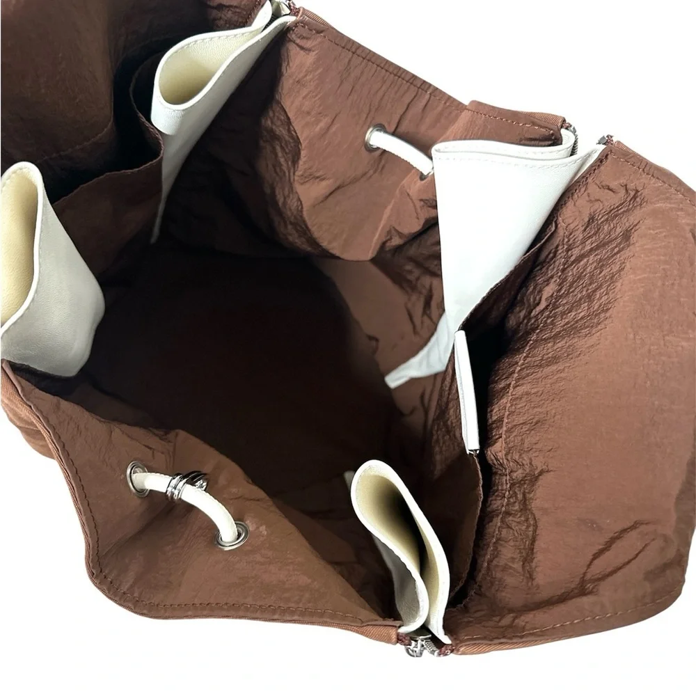 Tory Burch Women's Spaghetti Strap Zip Bucket Bag BOURBON VANILLA / French Cream